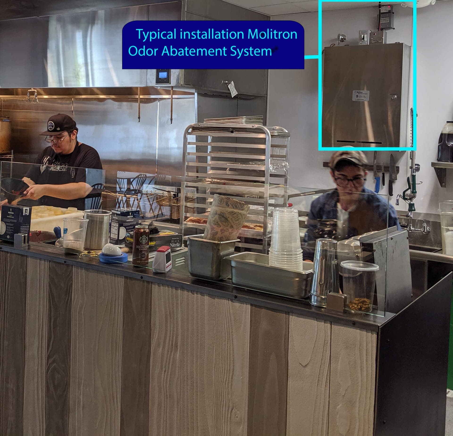 MOAS cabinet installed behind the serving counter in an operating commercial kitchen.