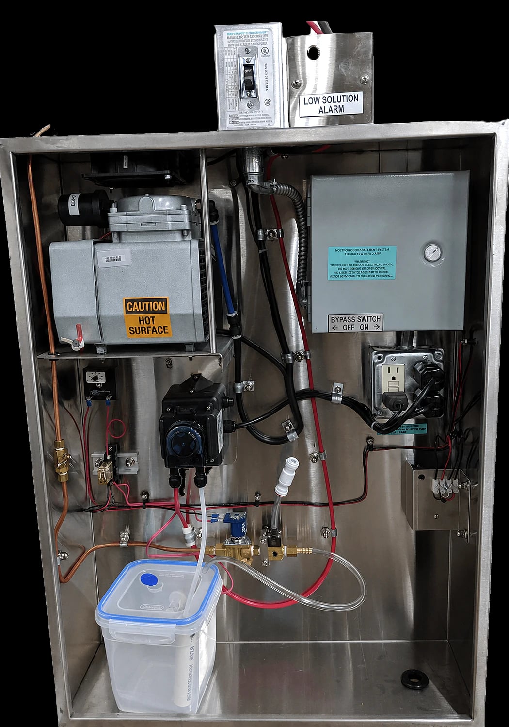 Open MOAS cabinet showing the operating components, tubing, and solution container